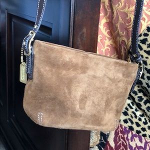 Vintage Coach brown suede purse. 7.5” W, 4.5” H.